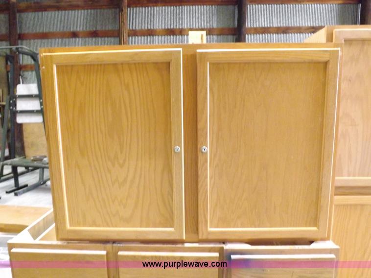 image for item I8366 (8) piece assorted cabinetry