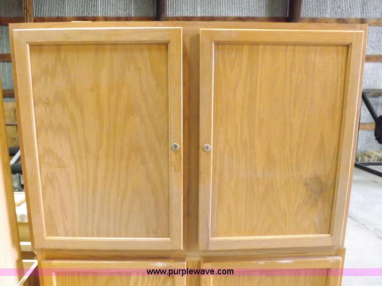 image for item I8366 (8) piece assorted cabinetry