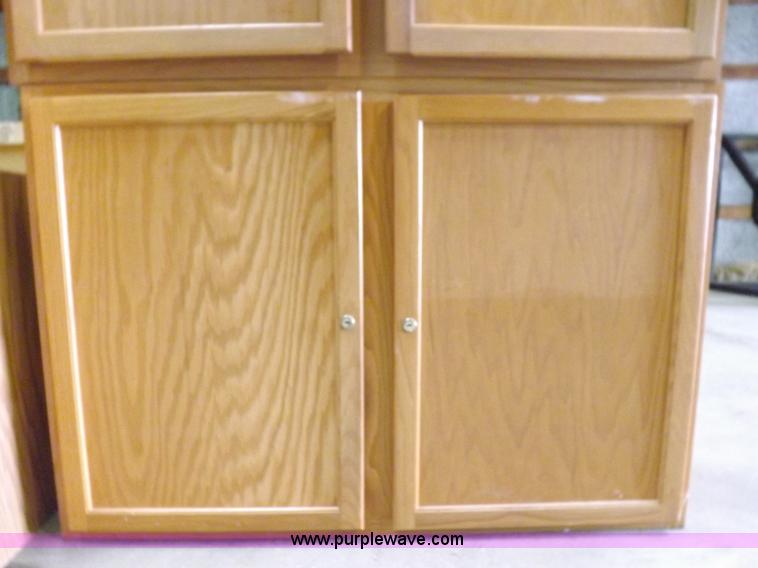 image for item I8366 (8) piece assorted cabinetry