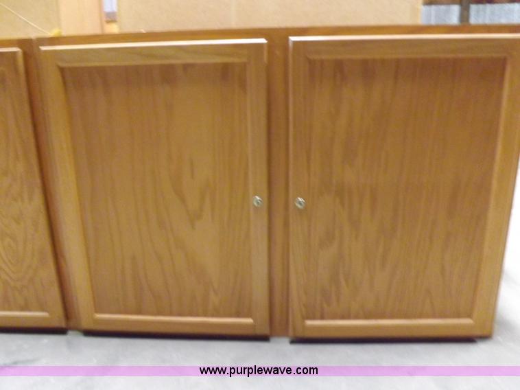 image for item I8366 (8) piece assorted cabinetry