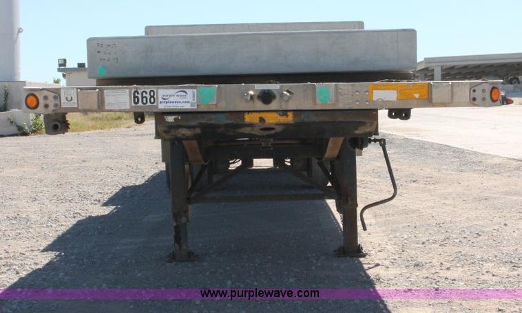 image for item H8437 2000 Utility FS2CHA flatbed spread axle trailer