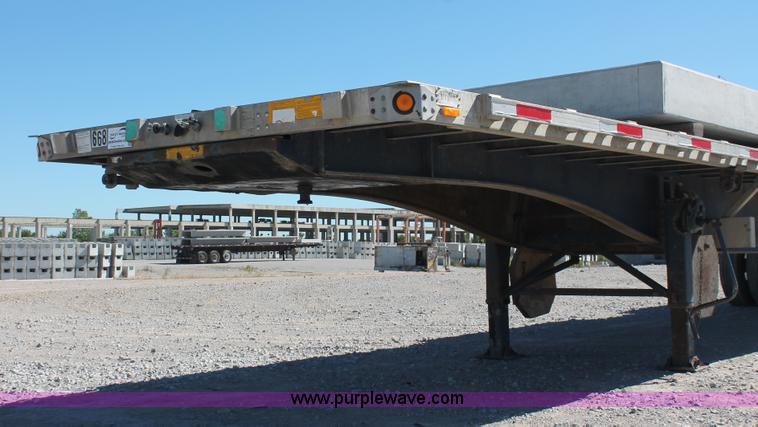 image for item H8437 2000 Utility FS2CHA flatbed spread axle trailer