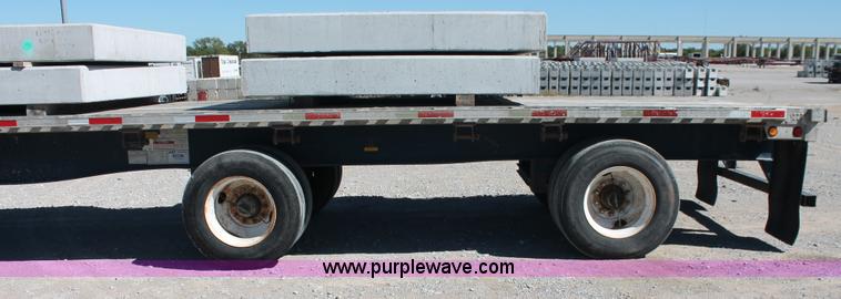 image for item H8437 2000 Utility FS2CHA flatbed spread axle trailer