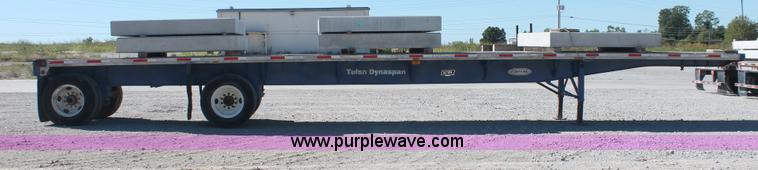 image for item H8439 1997 Fontaine LFTN-6-8048WSAK flatbed spread axle trailer