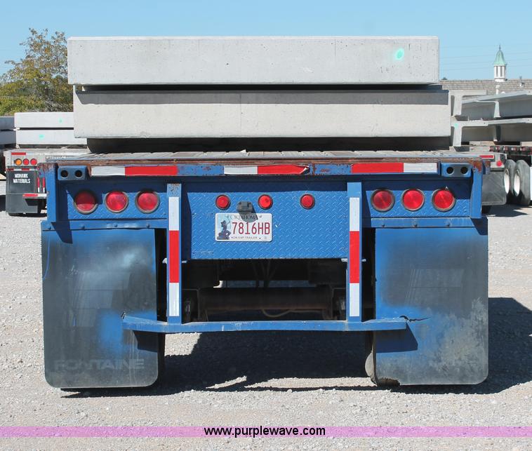 image for item H8439 1997 Fontaine LFTN-6-8048WSAK flatbed spread axle trailer