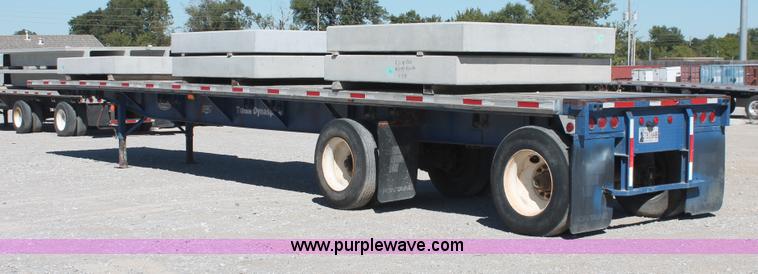 image for item H8439 1997 Fontaine LFTN-6-8048WSAK flatbed spread axle trailer