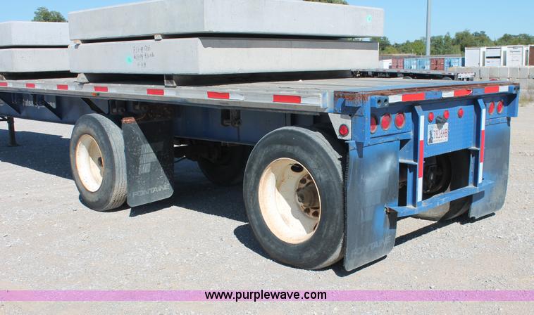 image for item H8439 1997 Fontaine LFTN-6-8048WSAK flatbed spread axle trailer