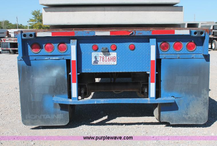 image for item H8439 1997 Fontaine LFTN-6-8048WSAK flatbed spread axle trailer