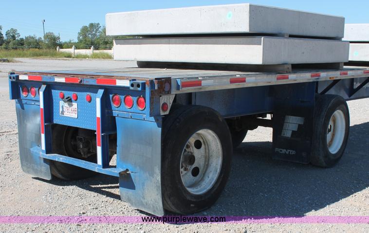 image for item H8439 1997 Fontaine LFTN-6-8048WSAK flatbed spread axle trailer