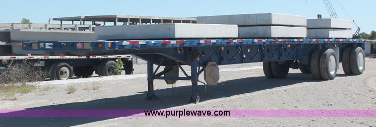 image for item H8442 1988 Transcraft TL-100K-48 flatbed spread axle trailer