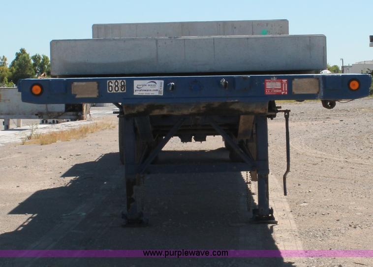 image for item H8442 1988 Transcraft TL-100K-48 flatbed spread axle trailer