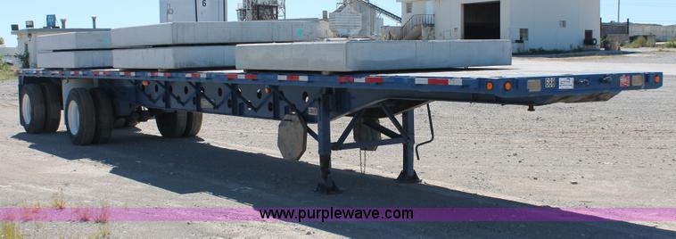 image for item H8442 1988 Transcraft TL-100K-48 flatbed spread axle trailer