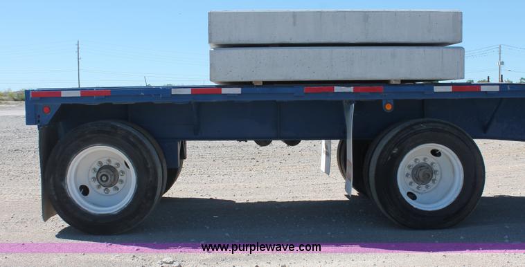 image for item H8442 1988 Transcraft TL-100K-48 flatbed spread axle trailer