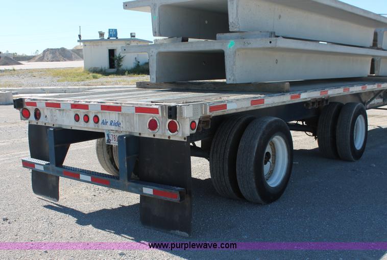 image for item H8443 2002 Utility FS2CHA flatbed spread axle trailer