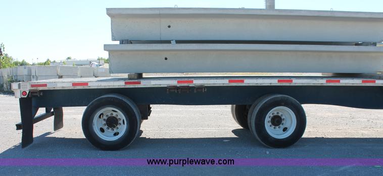 image for item H8443 2002 Utility FS2CHA flatbed spread axle trailer