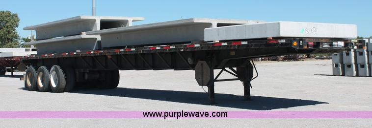 image for item H8445 2001 Fontaine TP-4-4880SL flatbed tri axle stretch trailer