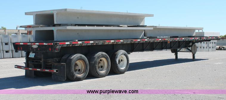 image for item H8445 2001 Fontaine TP-4-4880SL flatbed tri axle stretch trailer