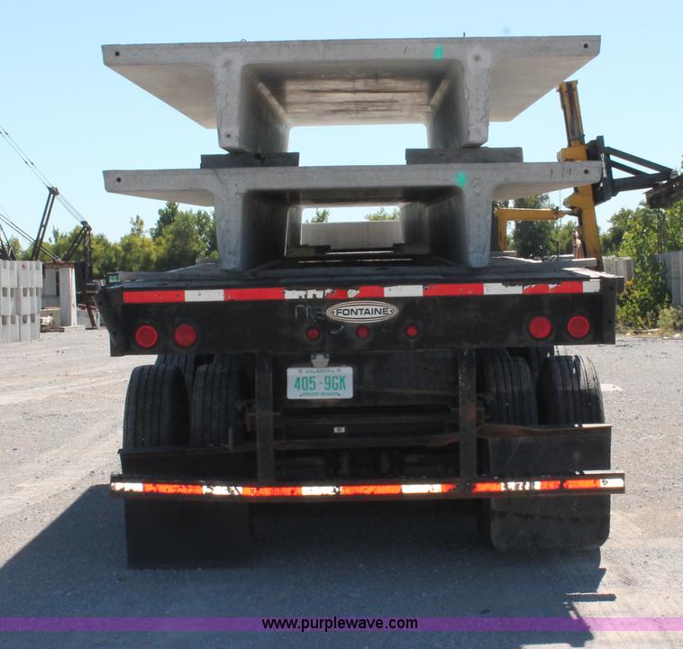 image for item H8445 2001 Fontaine TP-4-4880SL flatbed tri axle stretch trailer