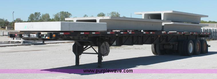 image for item H8445 2001 Fontaine TP-4-4880SL flatbed tri axle stretch trailer