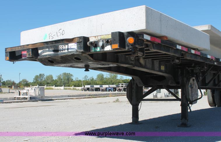 image for item H8445 2001 Fontaine TP-4-4880SL flatbed tri axle stretch trailer