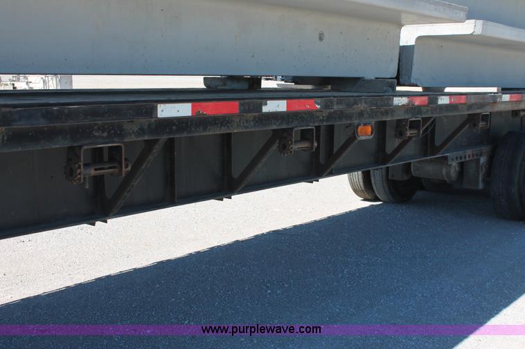 image for item H8445 2001 Fontaine TP-4-4880SL flatbed tri axle stretch trailer