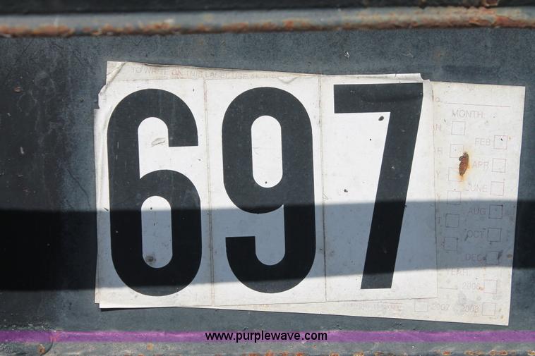 image for item H8445 2001 Fontaine TP-4-4880SL flatbed tri axle stretch trailer