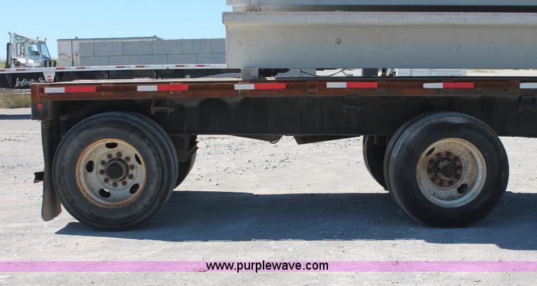 image for item H8447 2001 Fruehauf Fleet Flyer flatbed spread axle float trailer