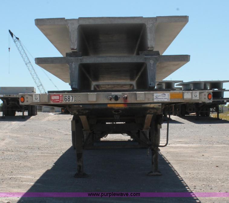 image for item H8449 2000 Utility flatbed spread axle float trailer