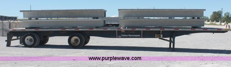 image for item H8449 2000 Utility flatbed spread axle float trailer