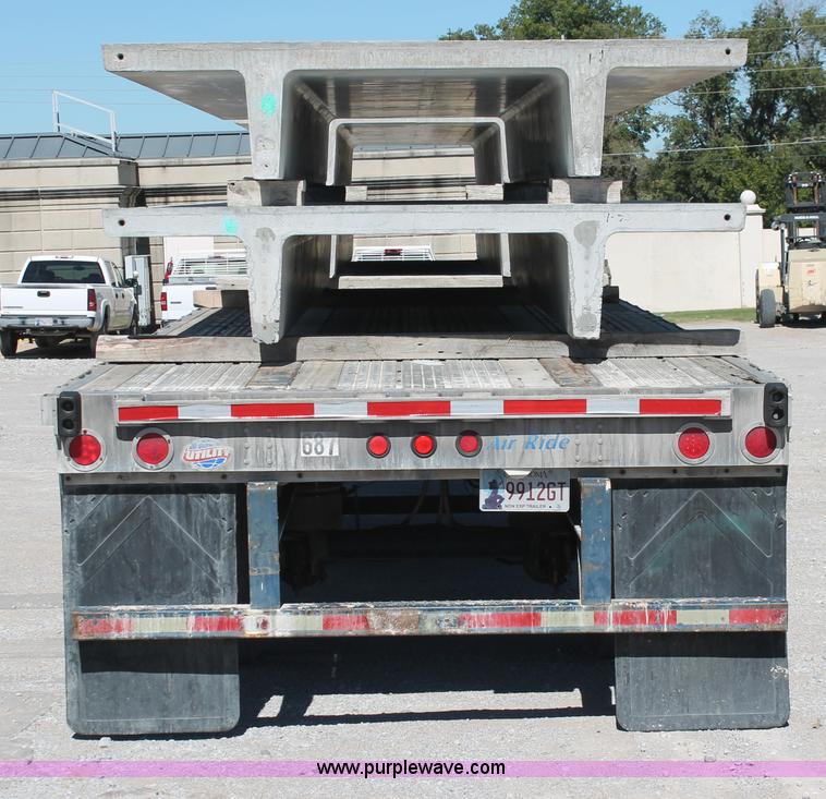 image for item H8449 2000 Utility flatbed spread axle float trailer