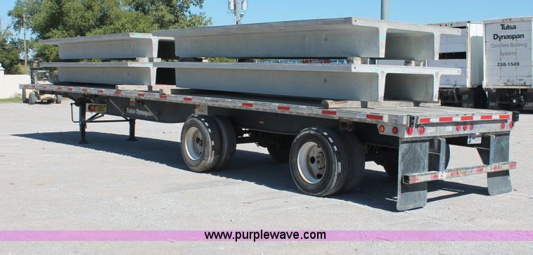 image for item H8449 2000 Utility flatbed spread axle float trailer