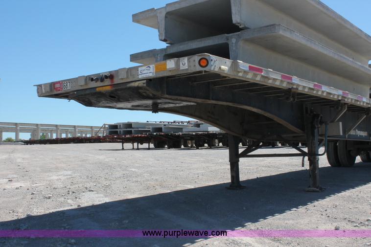 image for item H8449 2000 Utility flatbed spread axle float trailer