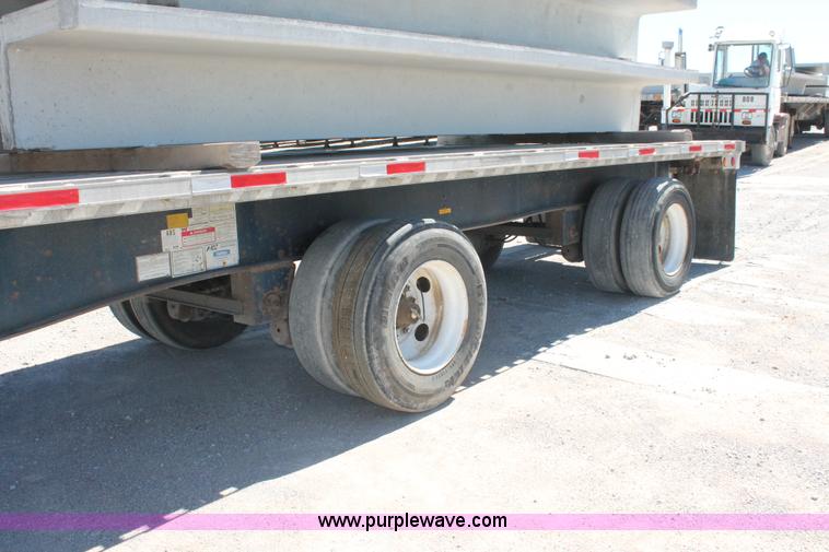 image for item H8449 2000 Utility flatbed spread axle float trailer