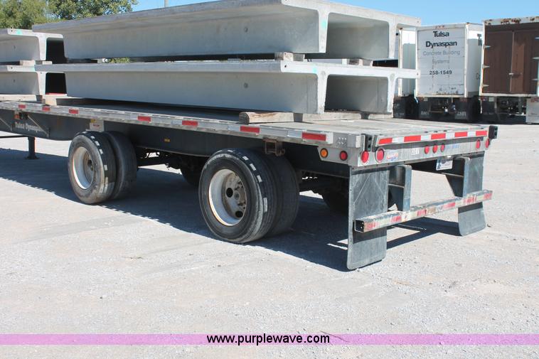 image for item H8449 2000 Utility flatbed spread axle float trailer