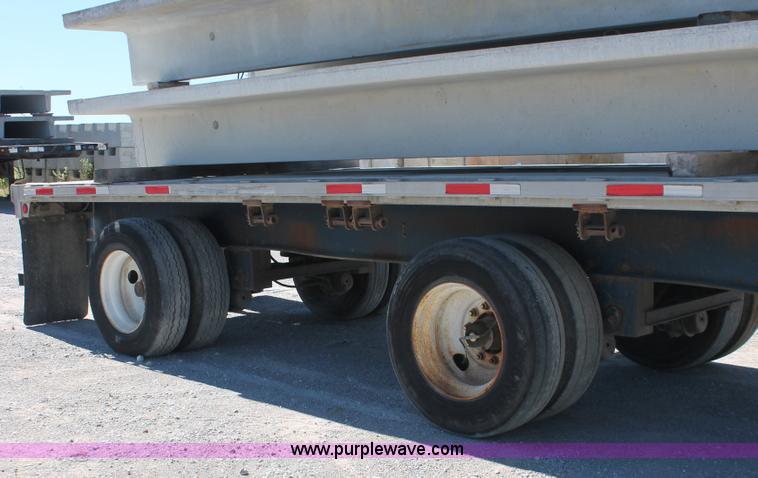 image for item H8449 2000 Utility flatbed spread axle float trailer