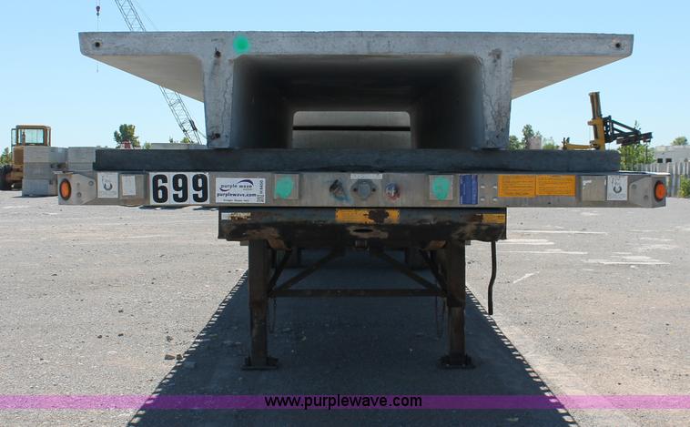 image for item H8450 2000 Utility flatbed spread axle float trailer