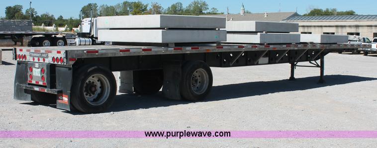 image for item H8451 1994 Transcraft Eagle WC-48X flatbed spread axle float trailer
