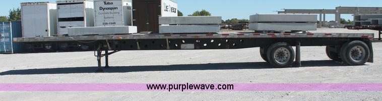 image for item H8451 1994 Transcraft Eagle WC-48X flatbed spread axle float trailer