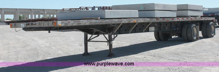 image for item H8451 1994 Transcraft Eagle WC-48X flatbed spread axle float trailer