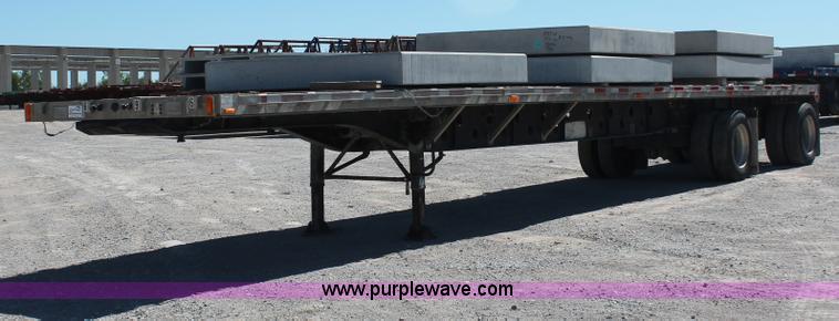 image for item H8451 1994 Transcraft Eagle WC-48X flatbed spread axle float trailer