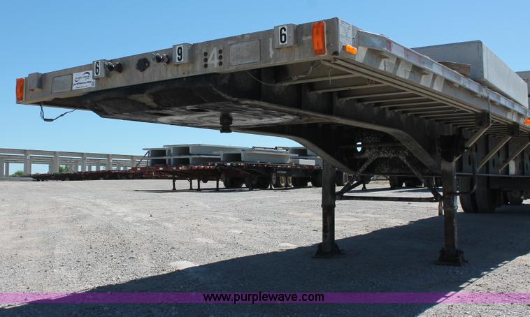 image for item H8451 1994 Transcraft Eagle WC-48X flatbed spread axle float trailer
