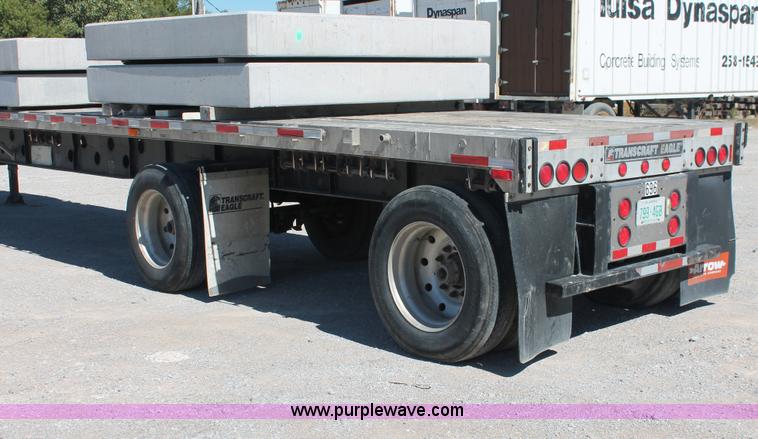 image for item H8451 1994 Transcraft Eagle WC-48X flatbed spread axle float trailer