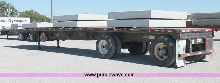 image for item H8453 2001 Fruehauf flatbed spread axle float trailer