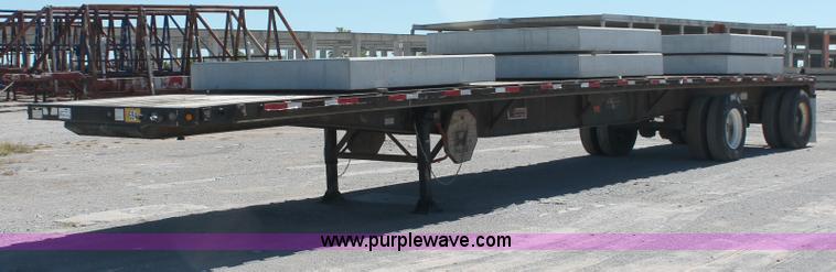 image for item H8453 2001 Fruehauf flatbed spread axle float trailer