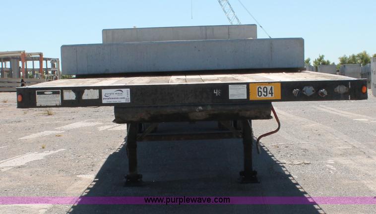 image for item H8453 2001 Fruehauf flatbed spread axle float trailer
