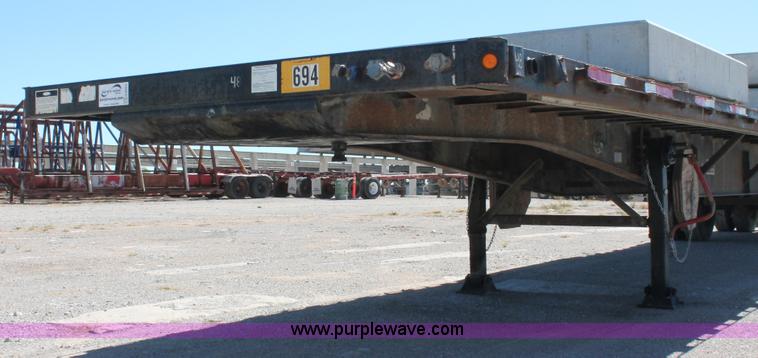 image for item H8453 2001 Fruehauf flatbed spread axle float trailer