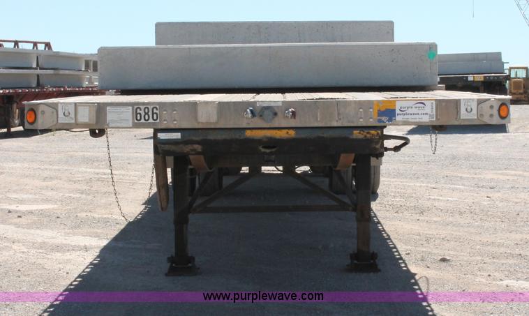 image for item H8454 2000 Utility flatbed tandem axle float trailer