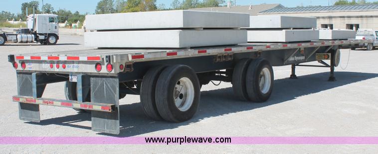 image for item H8454 2000 Utility flatbed tandem axle float trailer