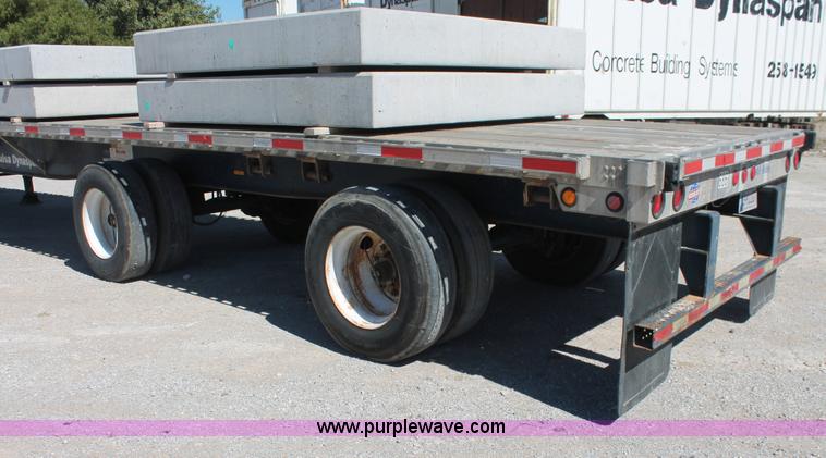 image for item H8454 2000 Utility flatbed tandem axle float trailer