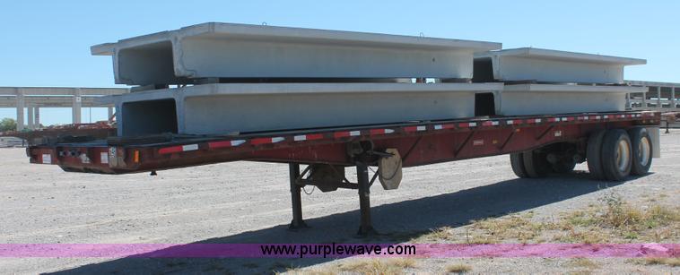 image for item H8457 1989 Fruehauf flatbed tandem axle float trailer